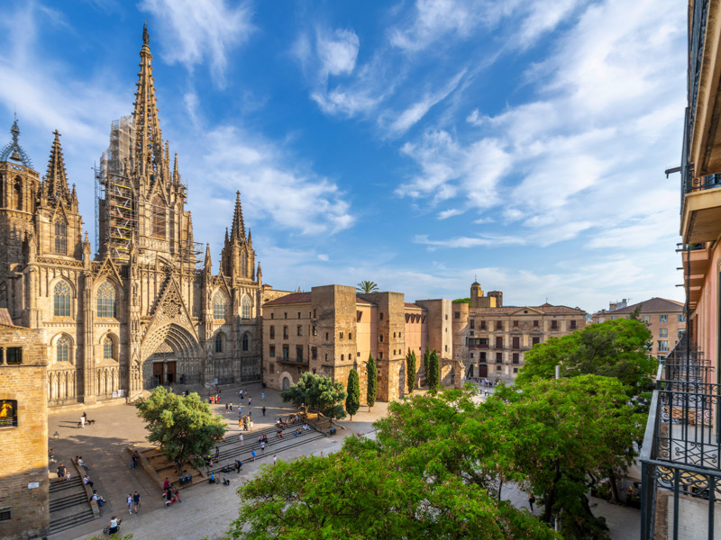 View from a balcony of the Gothic Barcelona Cathedral of the Holy Cross and Saint Eulalia and the plaza in the El Born district of Barcelona.